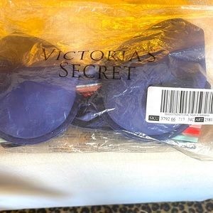 PINK Bra Navy with colorful strap back. Never worn